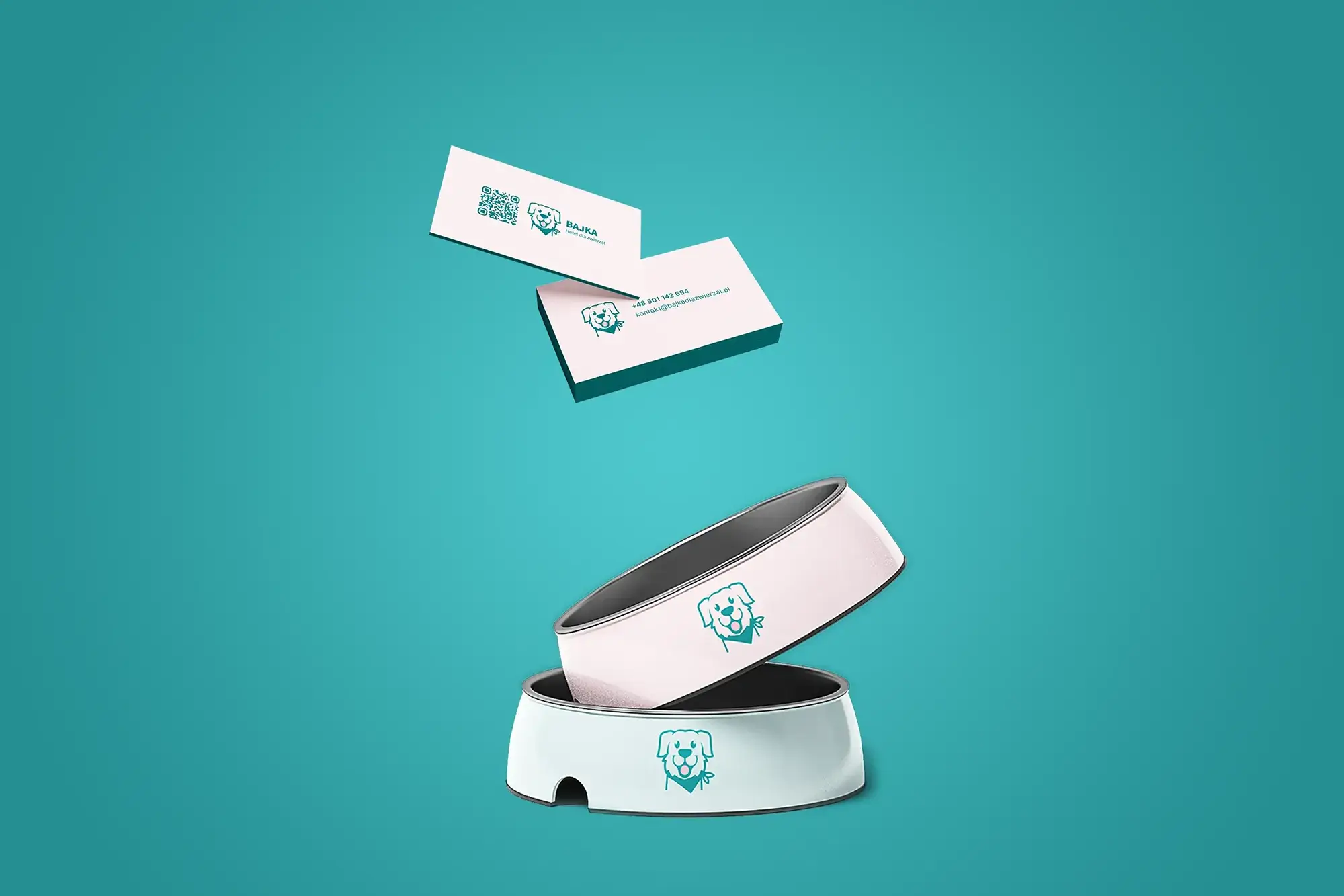 Dog bowls with Bajka pet hotel logo on teal background