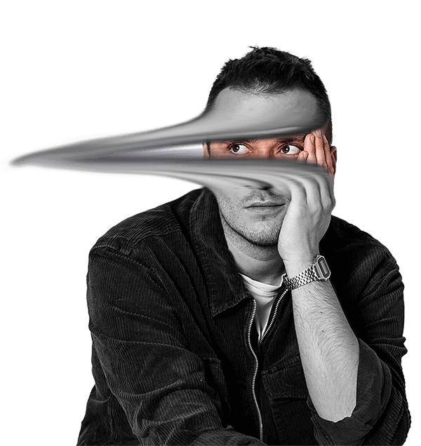 Portrait of Rafał Czuchryta, web and brand designer, sitting on a white background, modern black and white style.